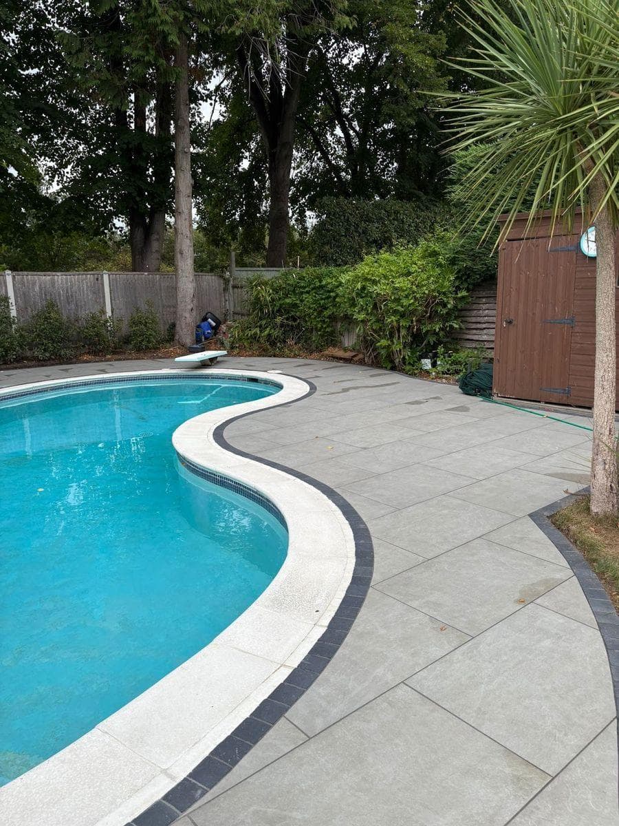 Porcelain paving around swimming pool surround
