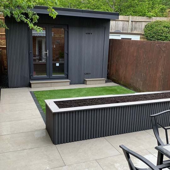 Garden transformation with porcelain paving and garden room